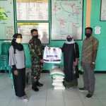 Babinsa Kodim 1607/Sumbawa Kawal Penyaluran Basos Covid-19