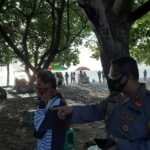 Pengunjung Pantai Harus Tetap Gunakan Masker