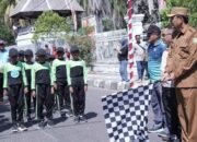 Semarak HUT RI ke-81: Bupati Sumbawa Lepas Ratusan Peserta Gerak Jalan Tepat Waktu Tingkat SD/MI